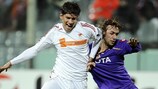 Debrecen's Zsolt Laczkó (left) challenges Fiorentina midfielder Marco Donadel