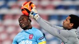 Robinson Zapata punches the ball away from Twente's Blaise Nkufo