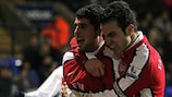 Fran Mérida and Cesc Fàbregas celebrate after both found the net for Arsenal
