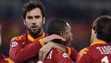 Júlio Baptista is mobbed after doubling Roma's lead at the Stadio Olimpico