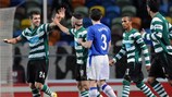 Miguel Veloso (left) takes the congratulations after opening the scoring for Sporting