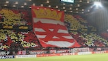Twente fans demonstrate the value of teamwork before kick-off against Bremen