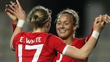 Ellen White (left) celebrates with Lianne Sanderson after scoring on her England debu