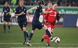 Corinne Yorston challenges Duisburg's Marina Hegering in the first leg