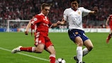 Ji-Sung Park (right) attempts to prevent Bayern's Philipp Lahm from delivering a cross