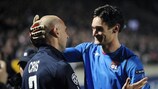 Goalkeeper Hugo Lloris is congratulated by Lyon team-mate Cris after a fine display against Bordeaux