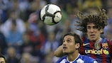 Carles Puyol (FC Barcelona) et duel avec Pablo Osvaldo (RCD Espanyol)