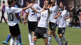 Kyra Malinowski (No18) celebrates after scoring in Germany's 4-1 victory
