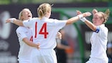 Laura Coombs (14) is congratulated by Abbie Prosser (left) and Toni Duggan after scoring England's third