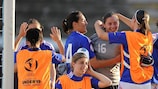 Laëtitia Philippe is mobbed at the final whistle of France's victory against Spain