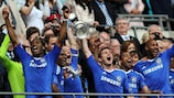 Triumphant Chelsea players lift the FA Cup after their 1-0 win against Portsmouth