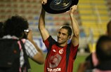 Etey Schecter lifts the Israeli Premier League trophy for Hapoel