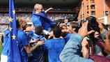 Luigi Delneri is carried from the Stadio Luigi Ferraris pitch after earning Sampdoria a place in the UEFA Champions League