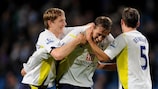 Peter Crouch (centre) is congratulated after the goal against Manchester City that confirmed Tottenham's UEFA Champions League qualification