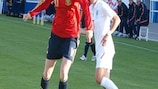 Spain goalscorer Adriana dribbles by Karen Carney in their FIFA Women's World Cup qualifier