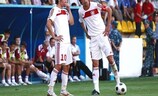 Samat Smakov (right) stands over a set piece against Hapoel
