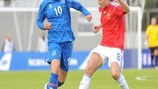 France (in red) won 1-0 in Iceland to ensure a play-off berth