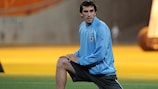 Diego Godín, pictured limbering up for Uruguay at the World Cup, has joined Atlético