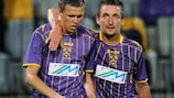 Josip Iličič and Armin Bačinovič celebrate a goal against Palermo
