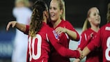 Jehona Mehmeti and Sandra Betschart celebrate the 0-0 draw with Denmark that took Switzerland through