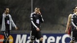 Os jogadores do Partizan desalentados após a derrota em Braga