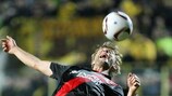 Simon Rolfes (left) of Bayer 04 Leverkusen competes against Juan Carlos Toja in the first leg