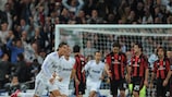 Cristiano Ronaldo (à g.) n'a eu aucun mal à percer le mur du Milan pour marquer le premier but du Real sur coup franc