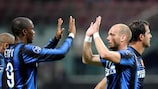 Samuel Eto'o and Wesley Sneijder celebrate on Matchday 3