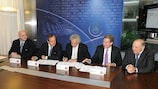 KOP/CFA president Costakis Koutsokoumnis and general secretary Phivos Vakis sign the convention