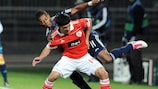 Maxi Pereira (front) tussles with Michel Bastos in Benfica's 2-0 loss at Lyon