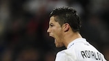 Cristiano Ronaldo celebrates scoring one of his three goals against Málaga