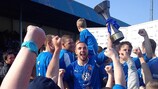 Sion Edwards of Bangor lifts the trophy after his side won the Welsh title