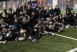 The Neftçi players celebrate their league title success