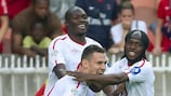 Ludovic Obraniak (middle) is congratulated after opening the scoring for Lille