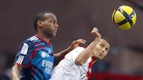 Lyon's Jimmy Briand (left) challenges Adriano Pereira