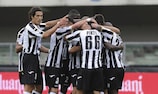 Kwadwo Asamoah's goal helped Udinese move another step closer to the UEFA Champions League