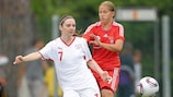 Switzerland's Michelle Probst attempts to keep possession from Snezhana Kobeleva of Russia
