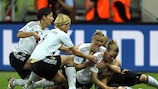 Simone Laudehr is surrounded by team-mates after scoring the winning goal for Germany against Nigeria in the FIFA Women's World Cup