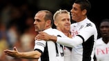 Damien Duff (centre) is congratulated on his opening goal by Danny Murphy and Matthew Briggs