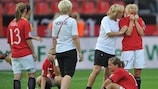 Lene Mykjåland of Norway (right) looks dejected after their World Cup exit