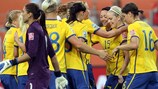 Lisa Dahlkvist (second right) celebrates after scoring Sweden's opening goal against the United States