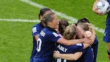France's players mob Élise Bussaglia after her late equaliser against England spared them defeat in the FIFA Women's World Cup quarter-final