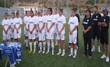 The Apollon players attend a 'blessing of the water' ceremony a their Limassol training ground