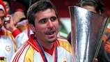 Gheorghe Hagi cradles the UEFA Cup after victory in the 2000 final with Galatasaray