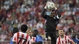 Marseille goalkeeper Steve Mandanda rises to collect the ball at Olympiacos