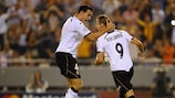 Roberto Soldado (right) celebrates scoring Valencia's late penalty equaliser with Adil Rami