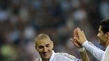 Former Lyon striker Karim Benzema (left) celebrates his matchday two goal with Cristiano Ronaldo