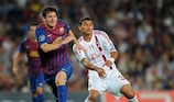 Thiago Silva tries to keep tabs on Lionel Messi at the Camp Nou