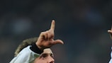 Miroslav Radović salutes the Legia supporters in Bucharest