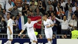 Karim Benzema celebrates scoring Madrid's first goal with Pepe and Mesut Özil
